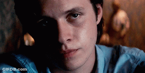 Young Man In Blue Shirt Close Up GIF