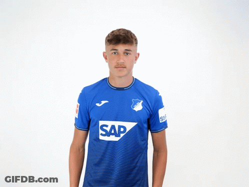 Young Man In Blue Shirt Saying SAP GIF
