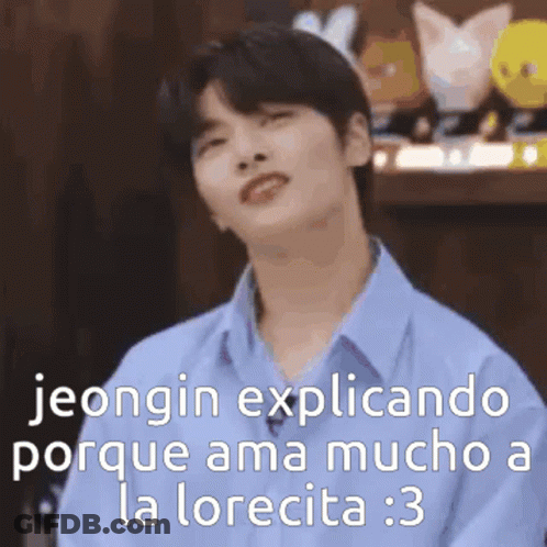 Young Man In Blue Shirt With Funny Face At Toys GIF