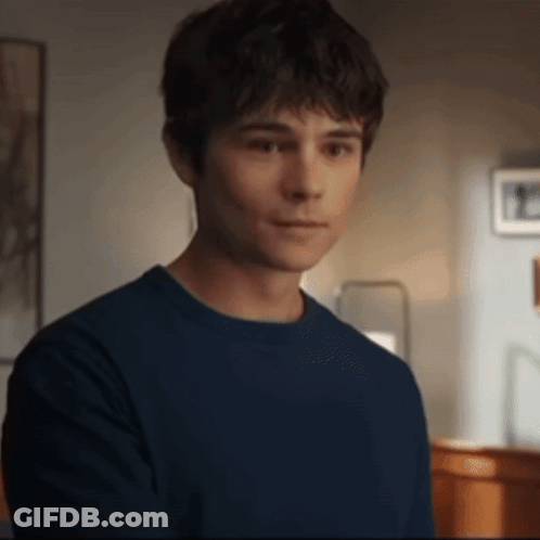 Young Man In Blue Sweater GIF