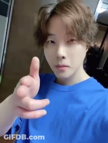 Young Man In Blue T-Shirt Giving Thumbs Up GIF