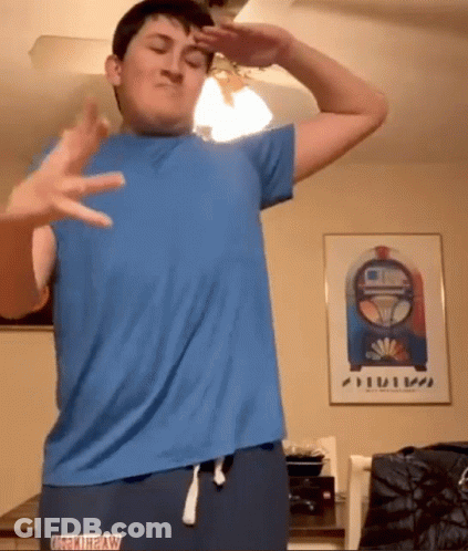 Young Man In Blue U.S. Army Shirt GIF