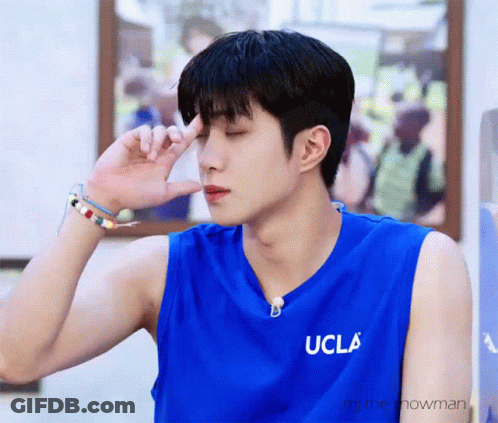 Young Man In Blue UCLA Shirt GIF