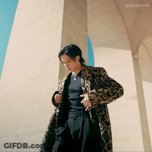 Young Man In Brown Jacket With Ring GIF