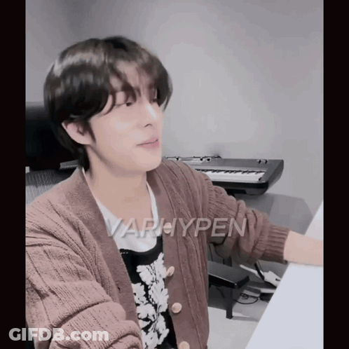 Young Man In Brown Sweater At Keyboard Saying Varhypen GIF