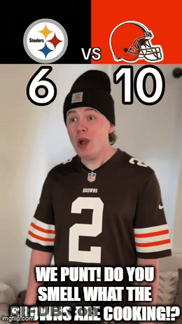 Young Man In Browns Jersey In Front Of Steelers And Browns Poster GIF