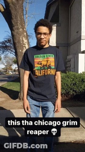 Young Man In California T-Shirt On Sidewalk GIF