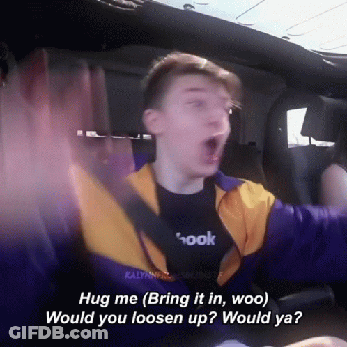 Young Man In Car Saying Hug Me Bring It In Woo GIF