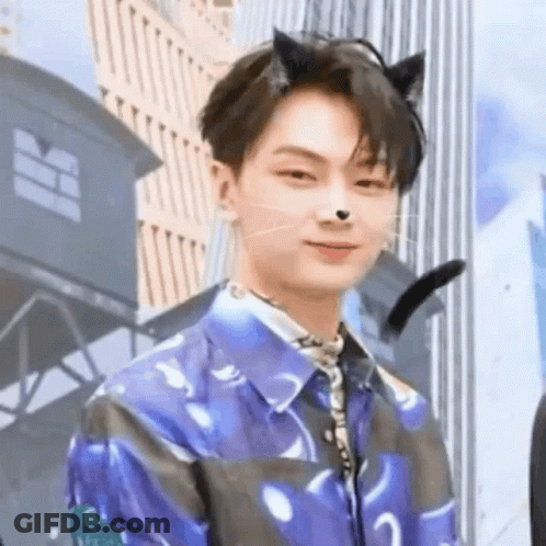 Young Man In Cat Ears And Blue Shirt GIF
