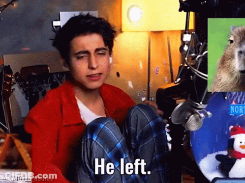 Young Man In Chair Saying He Left Eyes Closed GIF