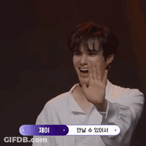 Young Man In Choker And White Shirt With Korean Writing GIF