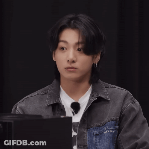 Young Man In Denim Jacket And White Shirt GIF
