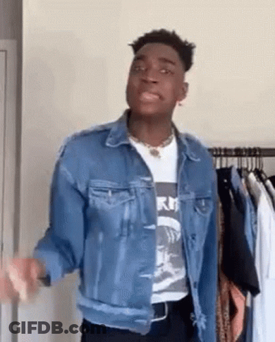 Young Man In Denim Jacket And White T-Shirt GIF