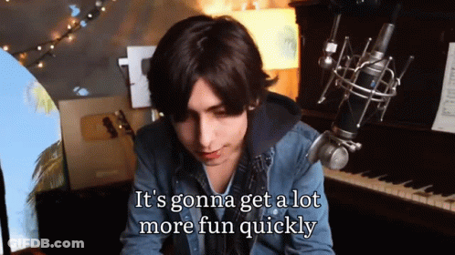 Young Man In Denim Jacket Singing GIF
