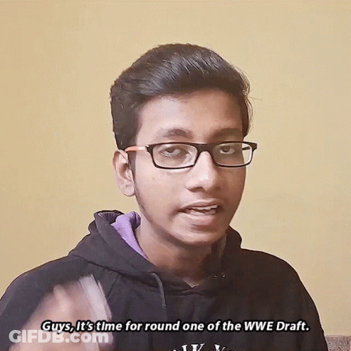 Young Man In Glasses And Black Hoodie Saying Guys It's Time For Round One Of The WWE Draft GIF