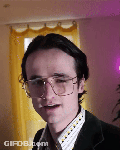 Young Man In Glasses And Black Jacket GIF