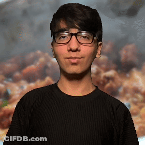 Young Man In Glasses And Black Shirt GIF