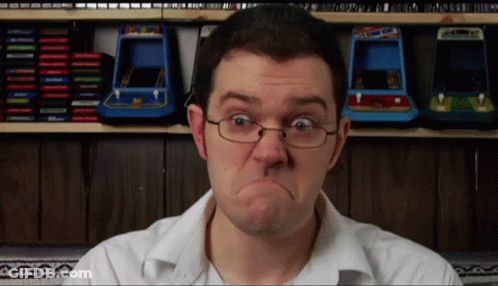 Young Man In Glasses And Plaid Shirt Saying How Did You Know I Read One Piece GIF