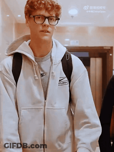 Young Man In Glasses And White Nike Sweatshirt GIF