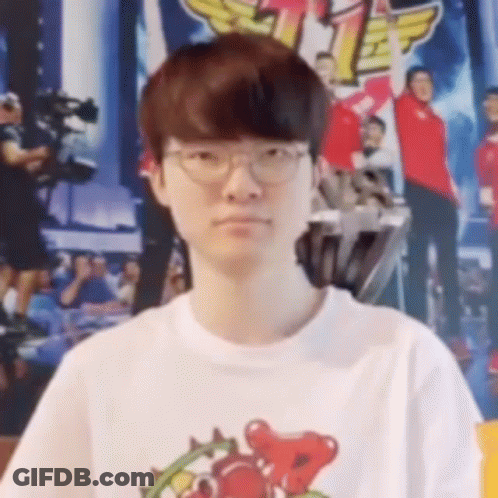 Young Man In Glasses And White T-Shirt GIF