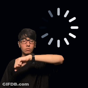 Young Man In Glasses Checking Watch GIF