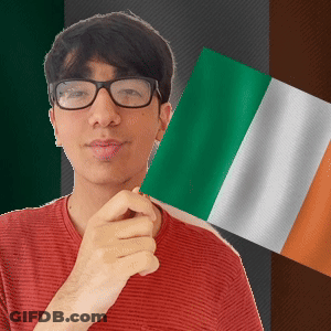 Young Man In Glasses Holding Green White And Orange Flag GIF
