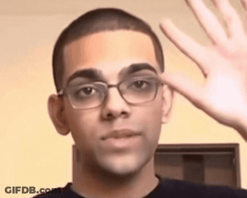 Young Man In Glasses Waving GIF