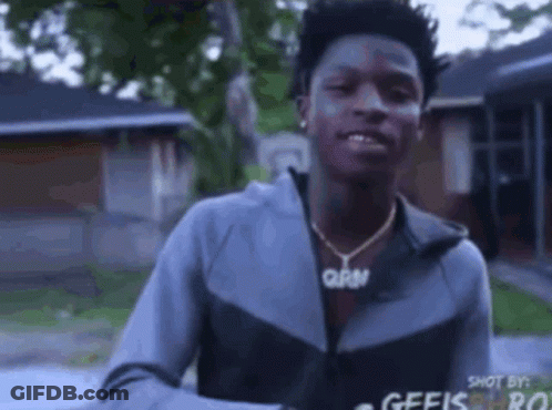 Young Man In Gray Jacket And Gold Necklace GIF