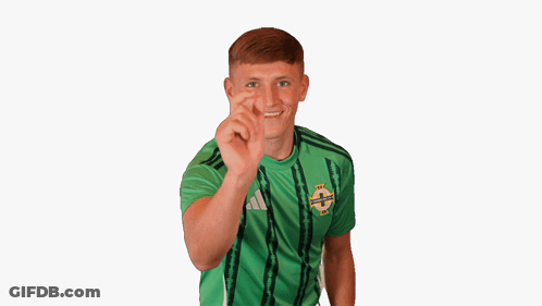 Young Man In Green Adidas Shirt Making Funny Face GIF