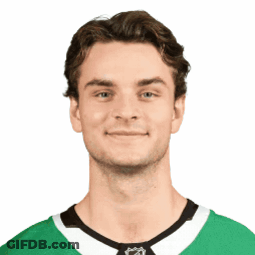 Young Man In Green And White NHL Jersey GIF