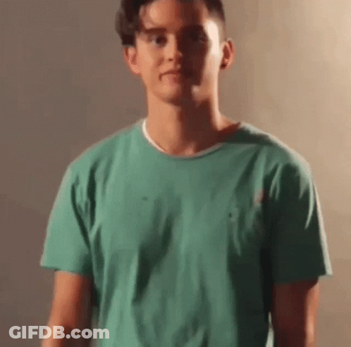 Young Man In Green Shirt GIF