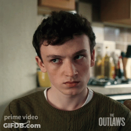 Young Man In Green Sweater The Outlaws GIF