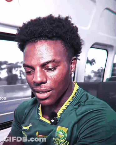 Young Man In Green Yellow Nike Shirt In Car GIF
