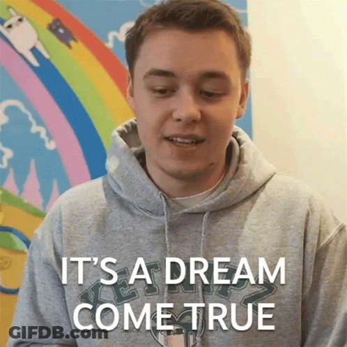 Young Man In Grey Hoodie Says It's A Dream Come True GIF