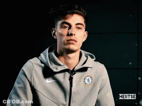 Young Man In Grey Nike Jacket With Chelsea Logo GIF