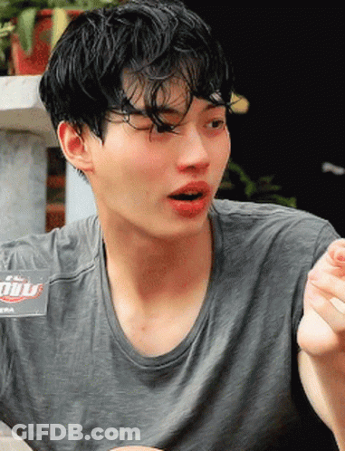 Young Man In Grey T-Shirt With Gulf Logo GIF