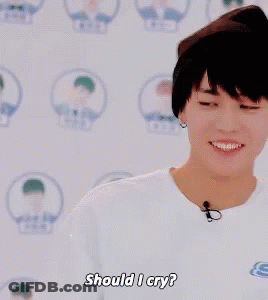 Young Man In Hat Talking Into Microphone GIF