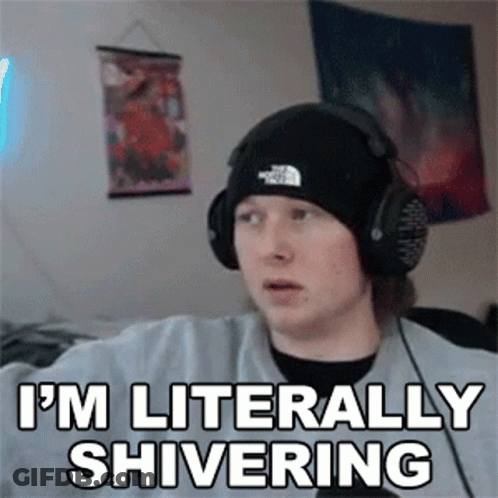 Young Man In Headphones And Beanie Making Funny Face GIF