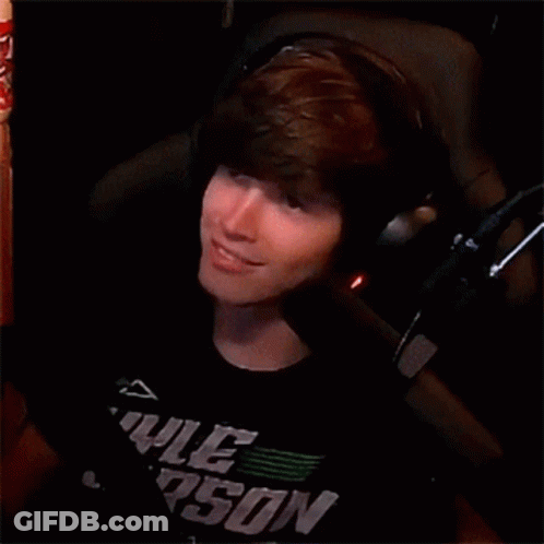 Young Man In Headphones And Kyle Arson Shirt GIF