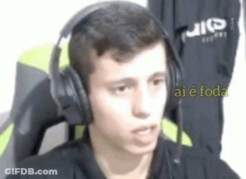 Young Man In Headphones Making Funny Face GIF