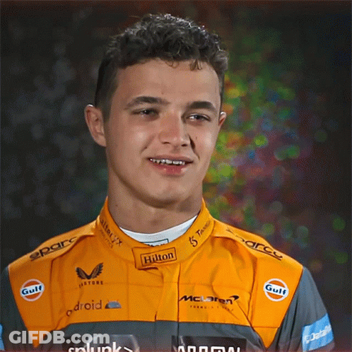 Young Man In Hilton Racing Suit Smiling GIF