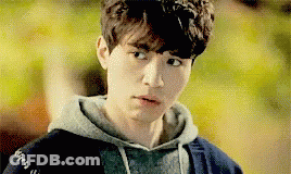 Young Man In Hoodie Close Up GIF