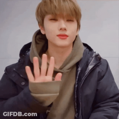 Young Man In Hoodie Making Peace Sign GIF