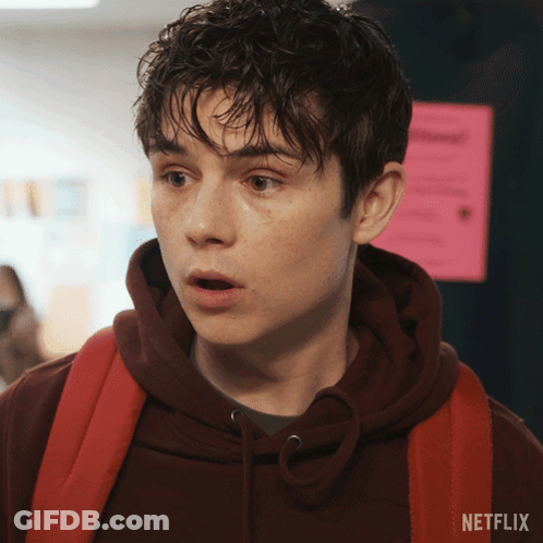 Young Man In Hoodie With Netflix Backpack GIF