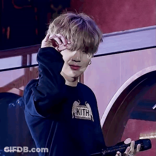 Young Man In Kith Shirt Holding Microphone GIF