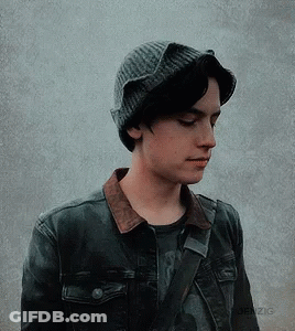 Young Man In Knitted Hat And Denim Jacket GIF