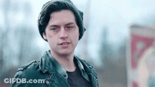 Young Man In Leather Jacket And Beanie GIF