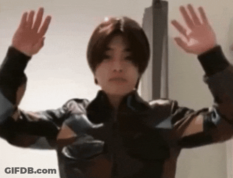 Young Man In Leather Jacket Arms Outstretched GIF
