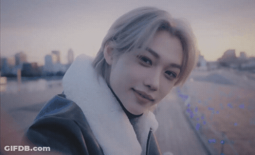 Young Man In Leather Jacket With Fur Collar GIF