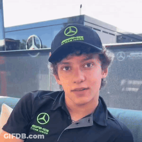 Young Man In Mercedes AMG Hat And Shirt GIF